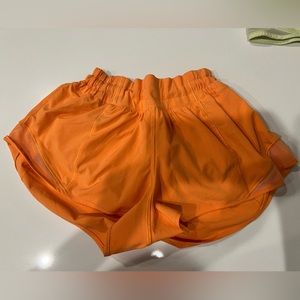 Orange lululemon hotty hot shorts size 4 length 2.5